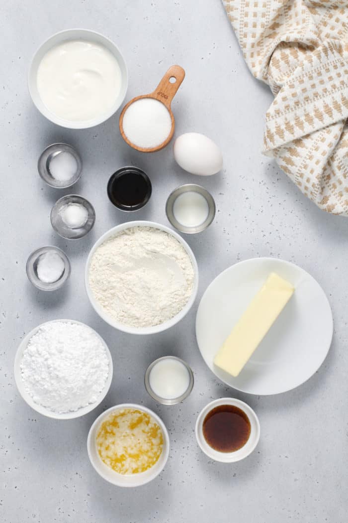 Vanilla bean scone ingredients arranged on a gray countertop.