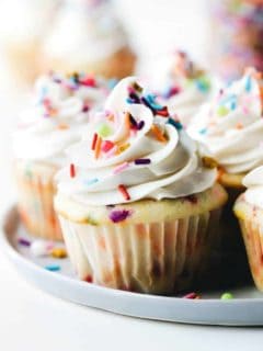 Frosted funfetti cupcakes on a platter