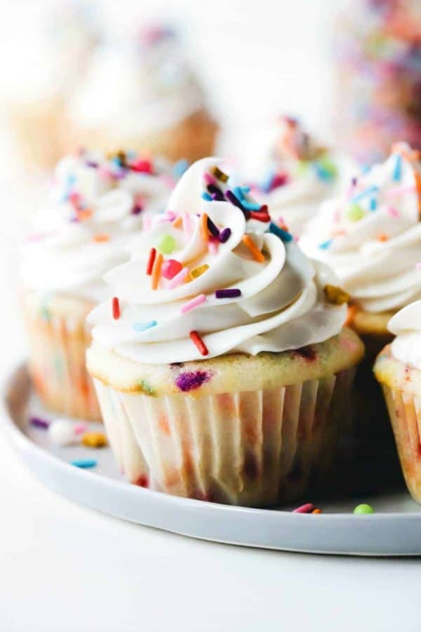Frosted funfetti cupcakes on a platter