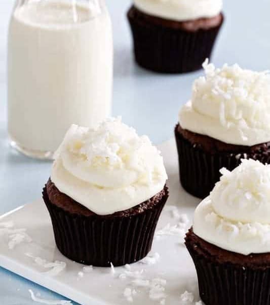 Almond Joy Cupcakes use just a handful of ingredients and a doctored up cake mix. They're some of the best cupcakes you'll ever make - with half the effort. Find them on MyBakingAddiction.com