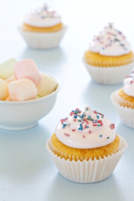 Sweet and fluffy frosting made with Campfire Fruit Swirlers is the perfect topping for Spring cupcakes.