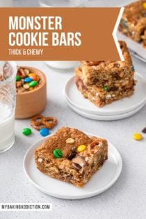 Two white plates, one holding 1 monster cookie bar and another holding 3. Text overlay includes recipe name.