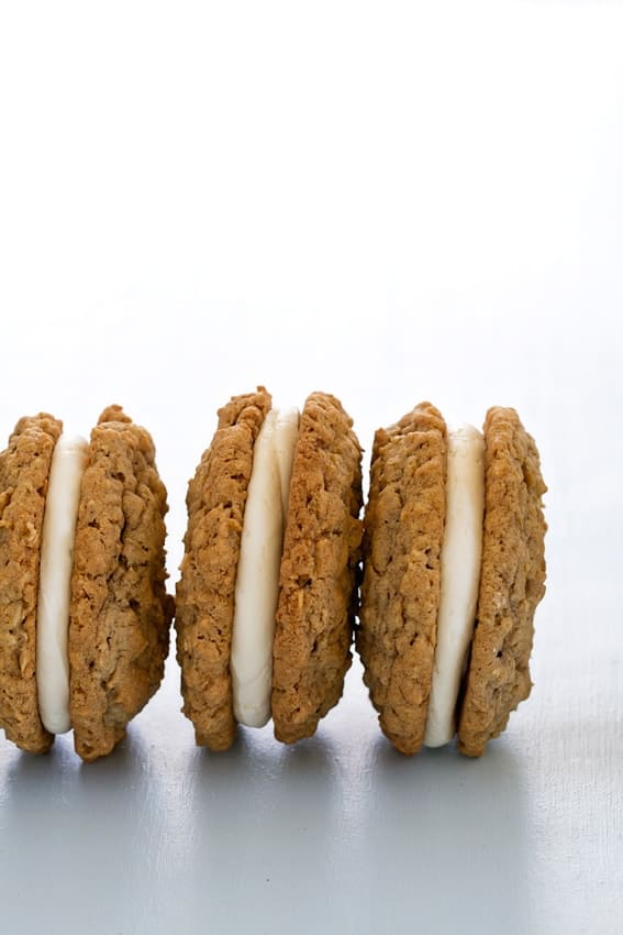 Giant Oatmeal Cream Pies sandwich buttercream between two chewy oatmeal cookies. Total decadence.