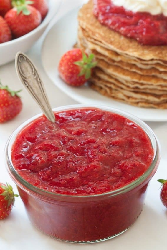 Gluten-Free Pancakes with strawberry sauce and whipped cream! So delicious. 