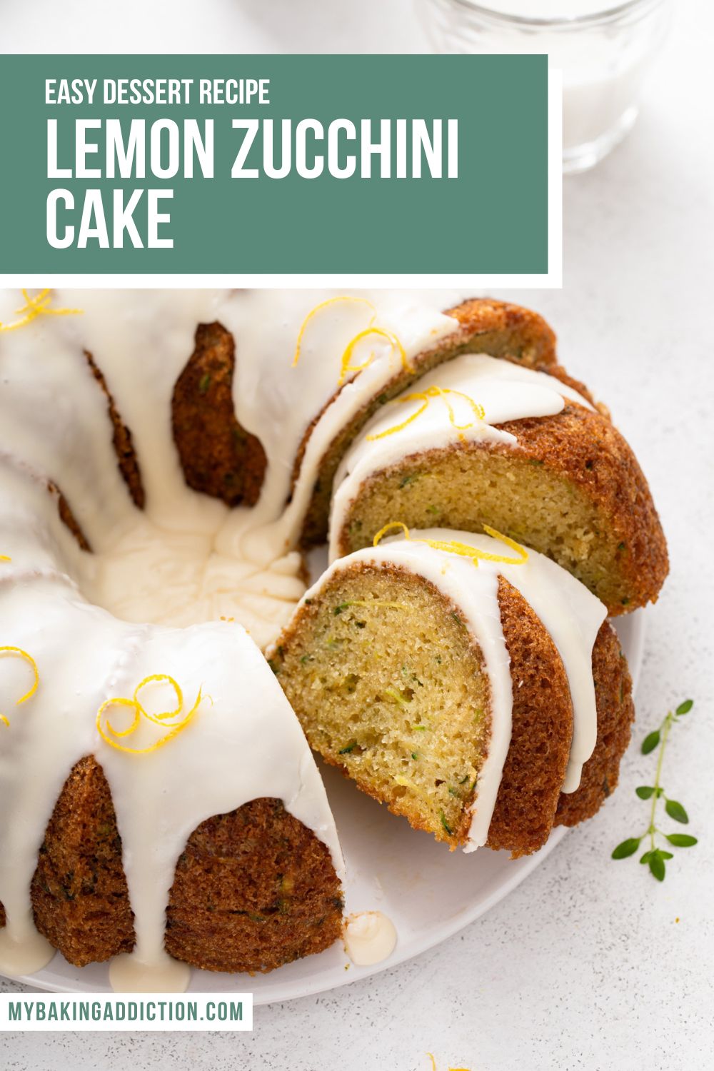 Sliced lemon zucchini bundt cake on a white cake plate. Text overlay includes recipe name.