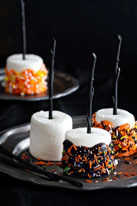 Halloween Marshmallow Pops are the handheld treat you want at your Halloween party. Colorful and delicious.