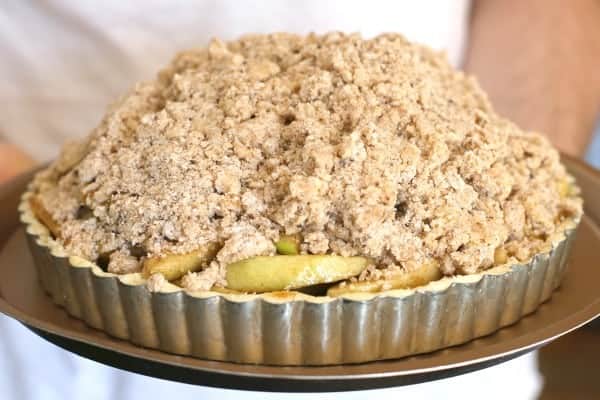 This gluten-free apple tart has a thick crumb topping and can also be made with traditional all-purpose flour.