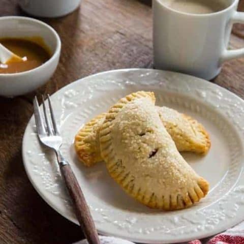 Apple Hand Pies have a flaky crust you'll swoon over. Stuffed with a sweet apple filling.