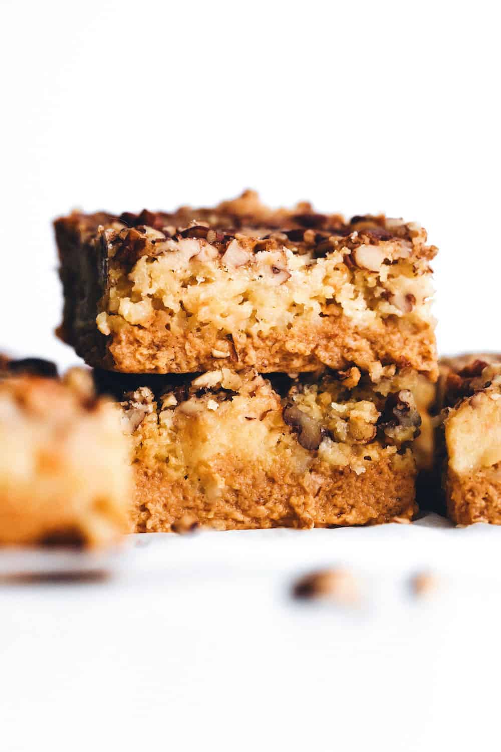 two pieces of stacked pumpkin crunch cake