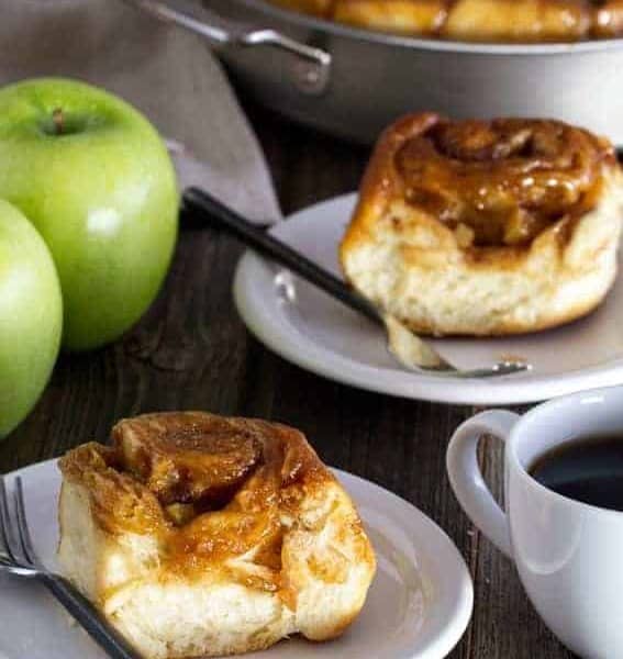 Caramel Apple Cinnamon Rolls have ooey gooey caramel on top and apples throughout. The essence of fall baking.