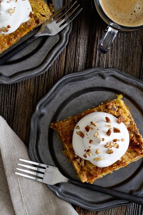 Pumpkin Crunch Cake is a classic fall dessert. Loaded with spices and topped with a dollop if whipped cream, it will quickly become your go-to dessert.