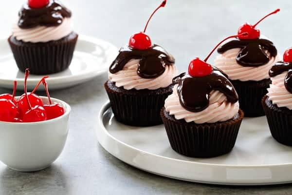 Coca-Cola Cupcakes have a gorgeous cherry infused buttercream on top. No straw required!