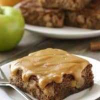 Caramel Apple Cake has a heavenly caramel sauce poured right on top. Sweet, salty, and totally sinful! Gluten-free option included.