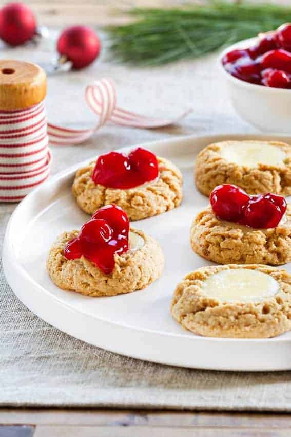 Cherry Cheesecake Cookies need to be on your table for the holidays. Let the cookie baking begin!