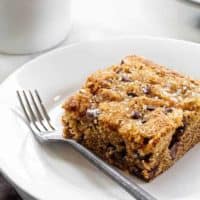 Date Cake is simple and delicious. It's flecked with chocolate chips and walnuts and topped with sparkling sugar.