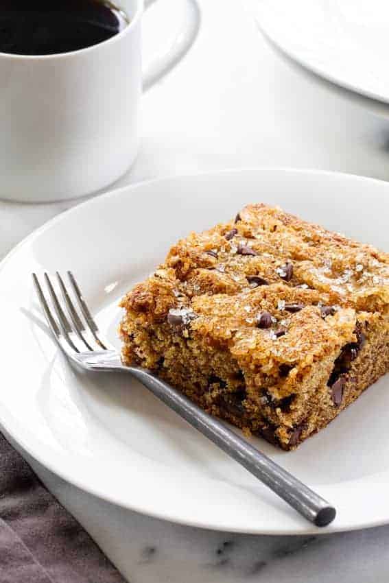 Date Cake is simple and delicious. It's flecked with chocolate chips and walnuts and topped with sparkling sugar.