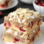 Cranberry bars with streusel and almond icing are extra special holiday dessert. Recipe includes a gluten-free option.