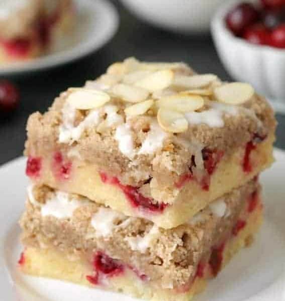 Cranberry bars with streusel and almond icing are extra special holiday dessert. Recipe includes a gluten-free option.