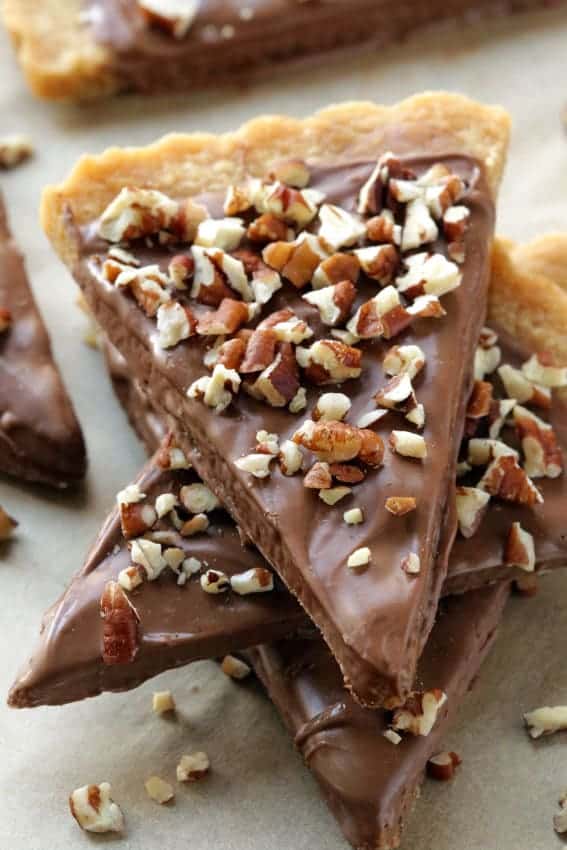 Gluten-Free Shortbread is covered in chocolate and sprinkled with crunchy nuts. All-purpose flour option included.