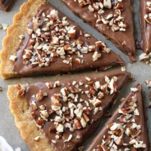 Gluten-Free Shortbread is drenched in chocolate and sprinkled with nuts. Easy and delicious. All-purpose flour option included.