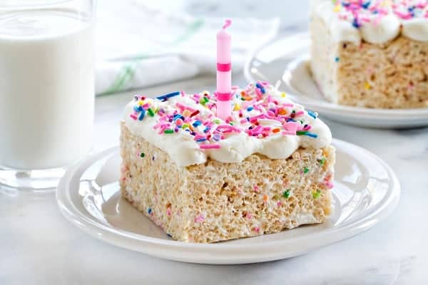 Birthday Marshmallow Cereal Treats are loaded with all the good stuff! Marshmallows, buttercream frosting and sprinkles! Who needs cake when you can have these?