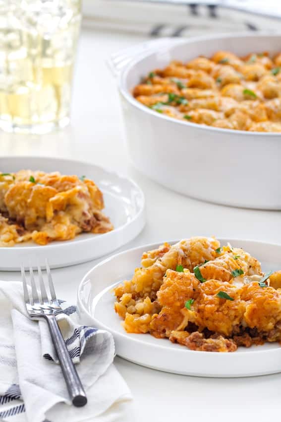 Cheeseburger Tater Tot Casserole has all the familiar flavors of a cheeseburger! Ketchup, mustard and even pickles! Comfort food at its finest!