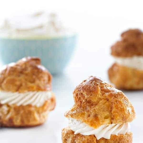 Churro Cream Puffs are filled with a sweet cinnamon whipped cream. Truly amazing.