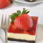 Strawberry white chocolate cheesecake bars have a chocolate cookie-like crust and strawberry jam topping. These are so good! Recipe contains a gluten-free option.