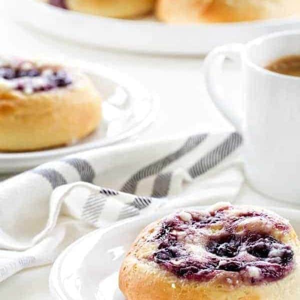 Blueberry Cream Cheese Kolaches hold a smooth and sweet blueberry cream cheese filling. One bite, and you're in love!