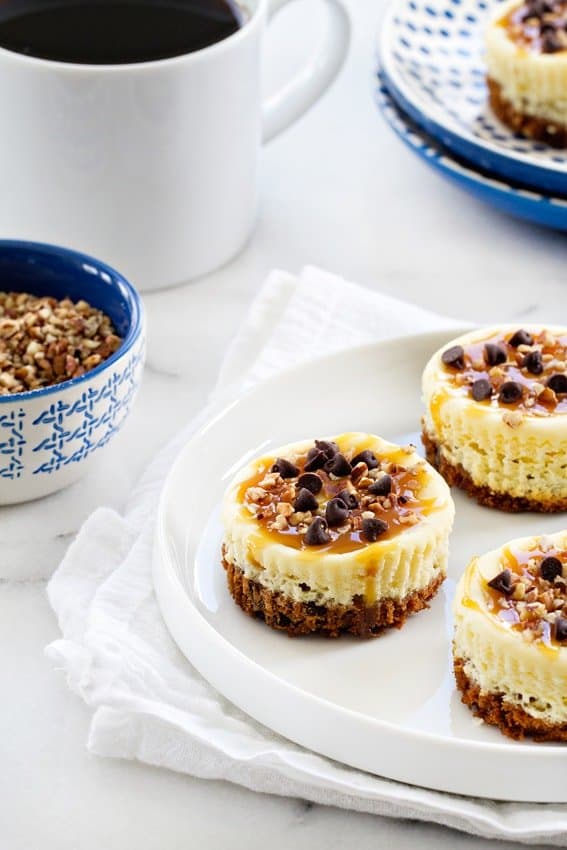 Turtle Cheesecake Cookie Cups made a great addition to your dessert table. A mini cheesecake just for you!