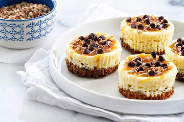 Turtle Cheesecake Cookie Cups are completely indulgent treats. And since they're bite-sized, have two, or three!