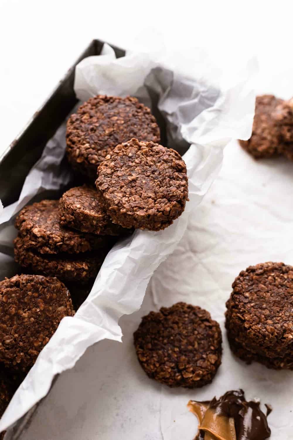 No bake cookies arranged in a parchment-lined loaf pan