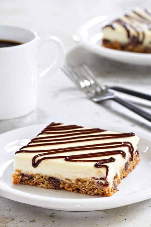 Oatmeal Chocolate Chip Cheesecake Bars have a delicious cookie crust that make them totally irresistible! You'll definitely want to make extra! 