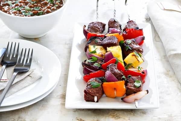 Sweet and Spicy Beef Kebabs are simple and delicious. Loaded with sweet and spicy flavors, they're sure to be your go-to dinner for grilling season!