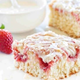 Strawberry Rhubarb Coffee Cake is filled with beautiful bites of sweetness in the cake and on top. Total heaven!