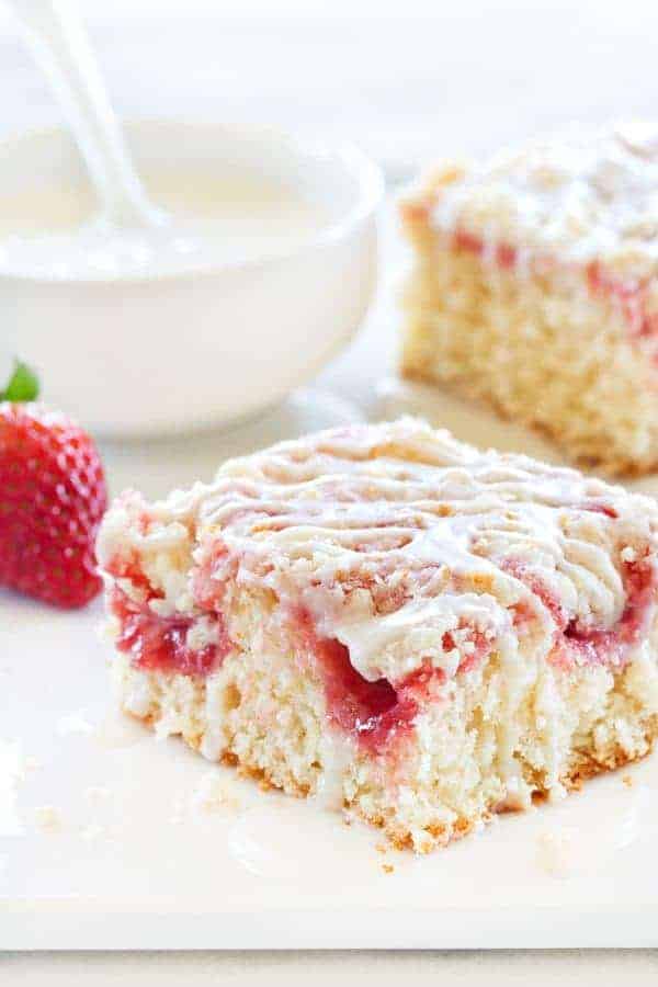 Strawberry Rhubarb Coffee Cake is filled with beautiful bites of sweetness in the cake and on top. Total heaven!