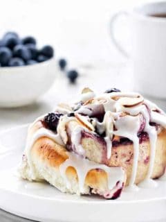 Blueberry Sweet Rolls a like a cinnamon roll but filled with blueberries. Sweet and indulgent!
