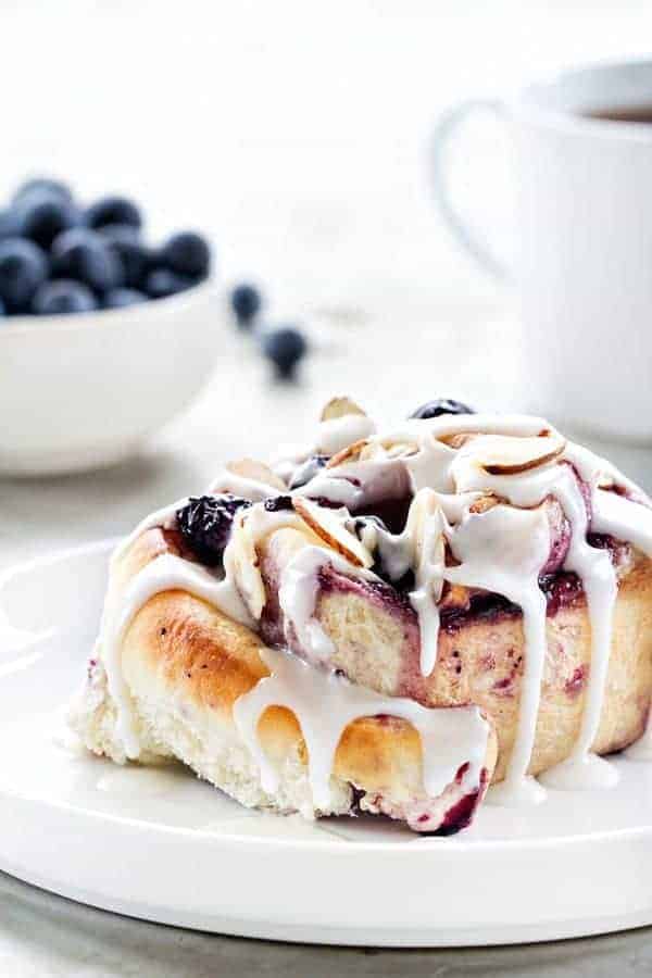 Blueberry Sweet  Rolls a like a cinnamon roll but filled with blueberries. Sweet and indulgent!