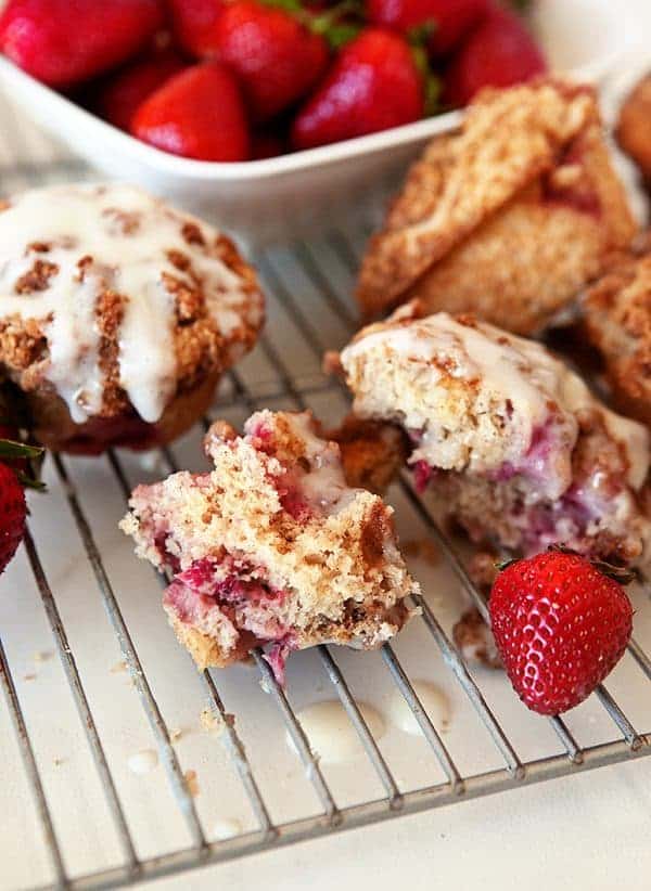 Strawberry Cinnamon Roll Muffins are perfect with your morning cup of coffee. Full of strawberry goodness!