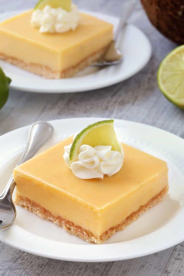 Key Lime Pie Bars have a creamy texture you'll fall in love with. Tart, sweet, and completely fabulous! Recipe contains a gluten-free option. 