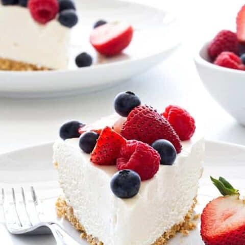 No Bake Frozen Cheesecake is the perfect way to celebrate summer. Top it fresh berries or chocolate sauce for one delicious dessert!