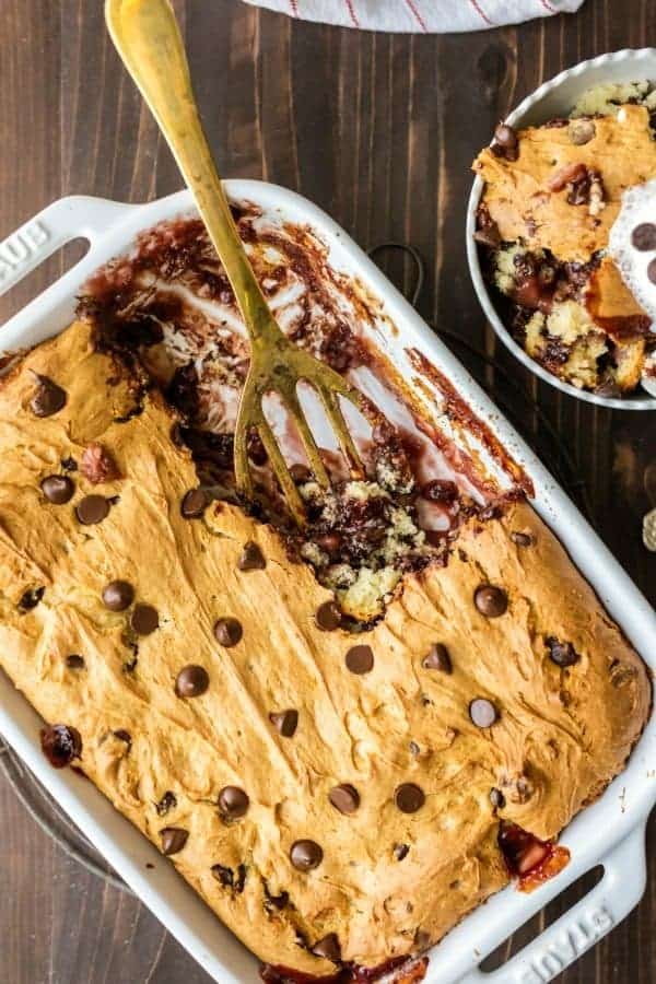 Banana Split Dump Cake couldn't be easier. This cake uses only 6 simple ingredients and comes together in minutes! Sure to be a crowd-pleaser!