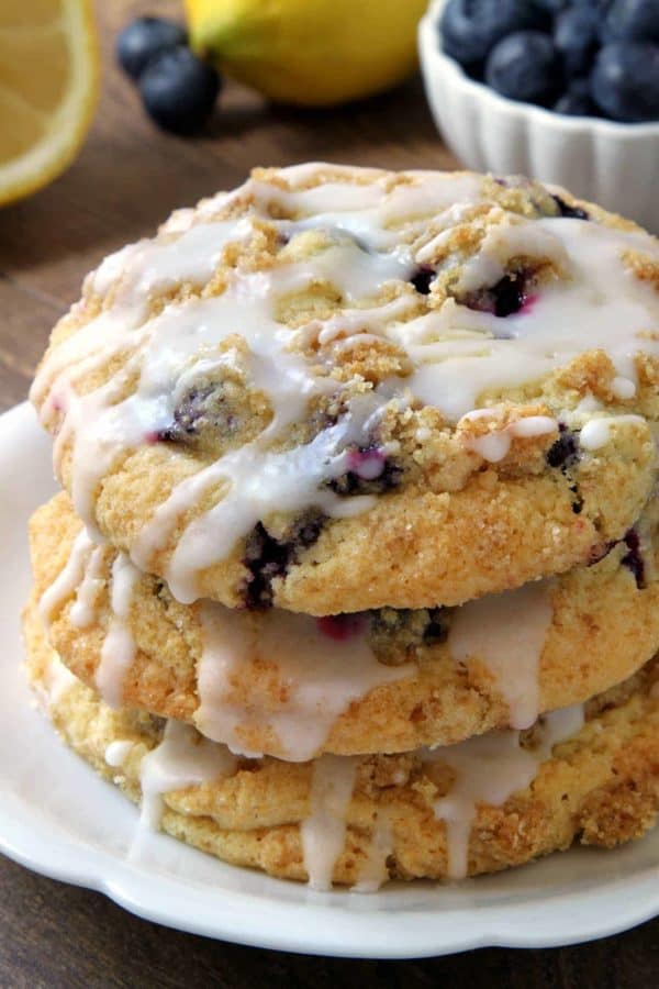 Blueberry Muffin Top Cookies are covered in streusel and drizzled with a lemon glaze. They're perfect for breakfast, dessert, or a midday snack. Recipe contains a gluten-free option.