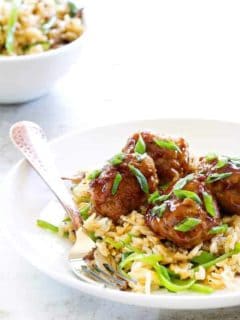 Soy-Ginger Meatballs with Zucchini and Snow Pea Fried Rice are an Asian-inspired meal with exquisite flavors. It'll become a regular in your house!