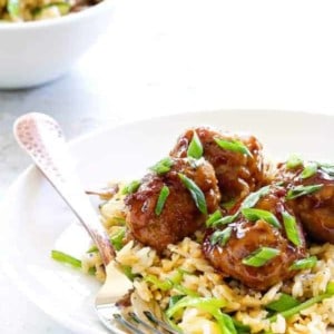 Soy-Ginger Meatballs with Zucchini and Snow Pea Fried Rice are an Asian-inspired meal with exquisite flavors. It'll become a regular in your house!