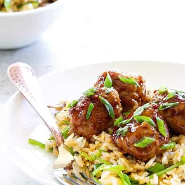 Soy-Ginger Meatballs with Zucchini and Snow Pea Fried Rice are an Asian-inspired meal with exquisite flavors. It'll become a regular in your house!