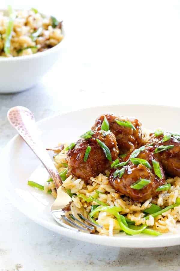 Soy-Ginger Meatballs with Zucchini and Snow Pea Fried Rice are an Asian-inspired meal with exquisite flavors. It'll become a regular in your house!