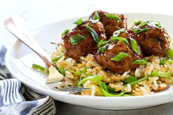 Soy-Ginger Meatballs with Zucchini and Snow Pea Fried Rice has amazing flavors and textures. You'll devour it!