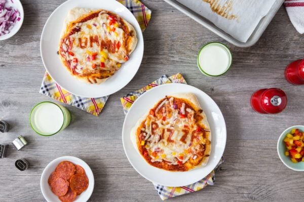 30 Minute Pizza Crust is super quick because there is no need for rising time. Divide the dough into mini crusts so everyone can create their own perfect pizza snack. So fun!