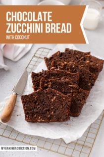 Sliced loaf of chocolate zucchini bread on a piece of parchment paper. Text overlay includes recipe name.